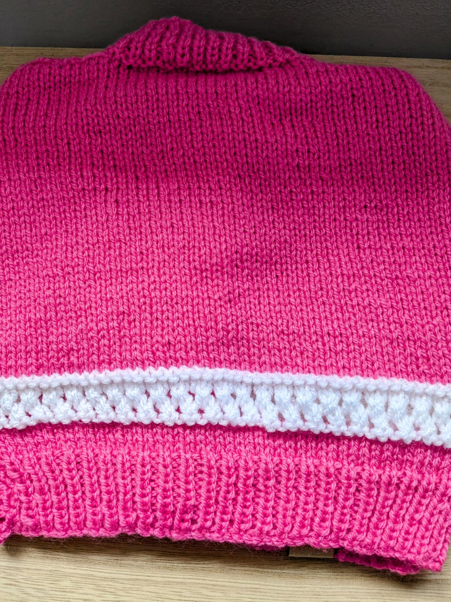 Pink and white bunny cardigan.